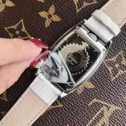 Dimini Silver Quartz Dress Rotation Watch(Barrel Shaped Hollow Watch) -Best Household Items product name 4192587